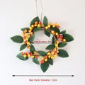 Couronne de baies oranges artificielles et feuilles vertes, 22 cm de diamètre extérieur - Couronne de baies avec feuilles