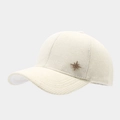 Detail of beige corduroy baseball cap texture with a gold star metal accent - Adjustable / White