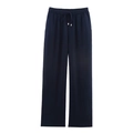 Detail of navy blue wide-leg linen trousers showing drawstring elastic waist and fabric texture - Navy Blue