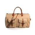 Grand sac de voyage en toile kaki avec sangles en cuir marron et bandoulière réglable - Style Toile / Kaki