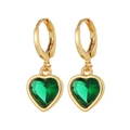 Detailed view of heart-shaped gold earrings with sparkling green crystal gemstones - Green