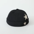 Detailed close-up of a black corduroy skullcap with white star patches for boys - 52cm (Recommended 2-5 Years) / Black