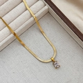 Detail of elegant gold snake chain necklace with rectangular green zircon stone - Gold White Zirconia