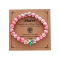 Pink and green beaded bracelet with starfish charm for sisters on brown card - Pink Green Starfish Card Bracelet