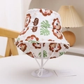 Detail of kids sun hat with lion print, cotton canvas material and chin strap - Off-White Lion