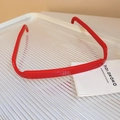 Vibrant red wavy hairband with glossy finish on a transparent textured tray - 53# Headband