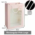 Pink gift bag with 35x25x15cm size, transparent window, and white rope handles - Large Rectangular Pink 35*25*15