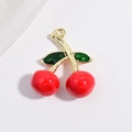 Detailed close-up of a red cherry fruit pendant with golden stem and green leaves - VD1658 Gold Red Enamel Green Zircon Cherry