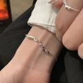 Silver liquid metal bracelet and ring set with blue and white zircon stones on wrist - Liquid Rhinestone Inlaid Style (SL1397)