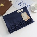 Deep blue cashmere-style scarf with fringe detail, flat lay with lifestyle props - Navy Blue / 200cm