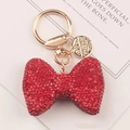 Portachiavi con fiocco di strass rossi e anello in oro per borse e accessori - Rosso