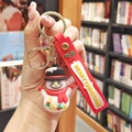 Christmas snowman keychain with a red Merry Christmas strap and gold metal ring - Gentleman Snowman (Gold Keychain)