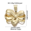 Macro detail of gold plated copper bow pendant with 22mm dimensions and mirror finish - YSN007-06 Gold Small Bow