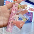Pink tiger liquid quicksand keychain with stars, glitter ball and silicone strap - Candy with Leather Rope