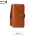Women's long RFID blocking wallet in brown PU leather with wristlet and zip-around closure - Brown