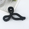 Matte black oversized butterfly hair claw clip with minimalist cutout design - Black