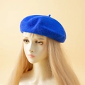 Vibrant electric blue cashmere-feel beret hat shown on a display head model - One Size / Sapphire Blue