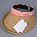 Close-up of straw sun hat with pink plaid fabric trim and detailed weave texture - M (56-58cm) / Pink