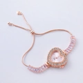 Detail of rose gold heart-shaped watch with crystal bezel and adjustable chain - Rose Gold-Heart Fendi Style