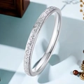 Detail of silver matte titanium steel ring featuring glitter texture and polished inner - US 5 / 2mm Width / Steel