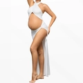 Detail of white maternity gown featuring a halter neck and high side slit for photo shoots - White