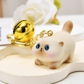 Cute beige Siamese cat keychain with blue eyes and a large golden bell ornament - Dazed Style