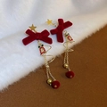 Detail of velvet red bow and golden star earrings with festive hanging ornaments - Velvet Bow Tassel Style (54)