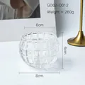 Clear pumpkin-shaped glass candle holder with embossed checkered texture for home decor - Large Square Grid