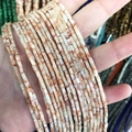 Perle rettangolari sfaccettate 2x4mm in pietra naturale bianco crema con venature marroni - Pietra a rete rossa