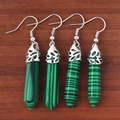 Detailed view of green hexagonal crystal drop earrings with engraved silver metal caps - Malachite
