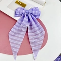 Purple striped sheer fabric bow hair clip with long ribbons on pink round mat - Purple Striped