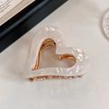 Elegant heart-shaped hair clip with white shell luster and golden metal accents - Mermaid White Heart Claw