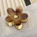 Elegant amber acetate flower hair claw clip with golden metal accents for women - Brown Coffee