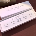 Detailed gift set featuring five pairs of silver stud earrings with a weekday display box - Set of 5 Pairs Silver Bead Faux Diamond Style (NS-11031-9)