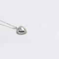 Collier cœur argenté minimaliste avec pendentif bordure soleil sur chaîne fine - Cœur Lisse (Argent)