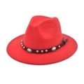 Detail of red fedora hat with turquoise studs on brown leather band for western style - Red