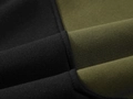 Close-up of black and olive green patchwork fleece hoodie with premium knit texture - Olive Black Patchwork