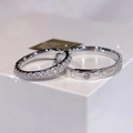 Minimalistisches Paar Ringe Set mit schimmernden Zirkonia-Steinen in Silberoptik - Paar Set