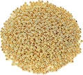 Macro shot of loose gold spacer beads for jewelry making with shiny metallic finish - 4mm 1200pcs/pack / Gold