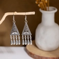 Macro detail of retro ethnic earrings with hollow triangles and metal tassels - E2874-5/Triangle Geometric Tassel
