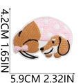 Detailed size view of cartoon dachshund embroidery patch measuring 5.9cm by 4.2cm - Size 18