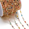 Macro detail of multicolored rectangular crystal chain in gold setting with size markers - 1 Meter/Pack / Gold Style 02 (Rectangle)