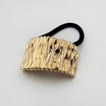 Fashionable black elastic hair tie with textured golden metal wave hair cuff - Vertical Ripple Texture (Hair Tie 25)