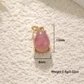 Macro shot of 13mm pink gemstone drop pendant with 18K gold plated copper base - Strawberry Quartz Water Drop Pendant