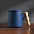 Minimalist matte dark blue ceramic mug featuring a natural wood handle and lid - Navy Blue