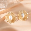 Elegant gold-plated openwork radial earrings with a central oval pearl on silk fabric - Round