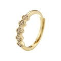 Macro detail of wave-shaped 18K gold-plated ring with shimmering zircon micro-inlays - VJ487 Gold (Wave Zigzag Zircon)