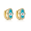 Détail des boucles d'oreilles Main de Fatma avec émail œil bleu et zircons brillants - Blanc