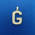 Golden pendant necklace charm in shape of letter G with sparkling crystals on blue fabric - Gold Letter G Shaped Pendant (752)