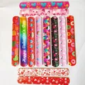 12-piece kids slap bracelets set featuring colorful hearts and unicorn cartoon patterns - 12 New Valentine's Designs